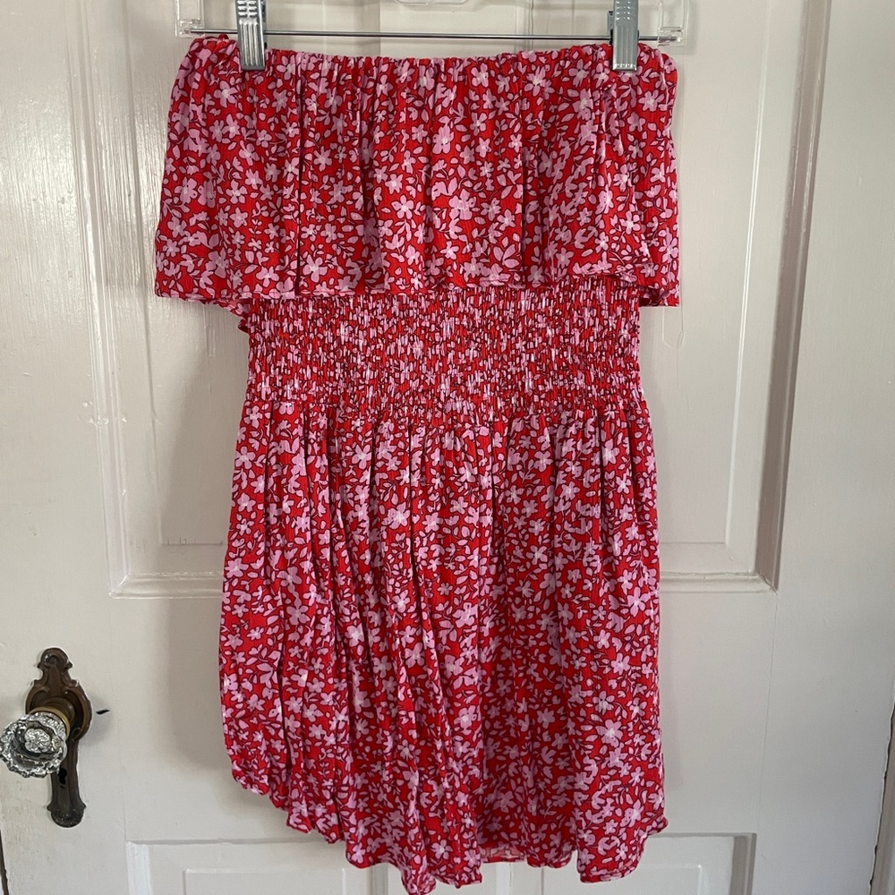 South moon under red floral romper
